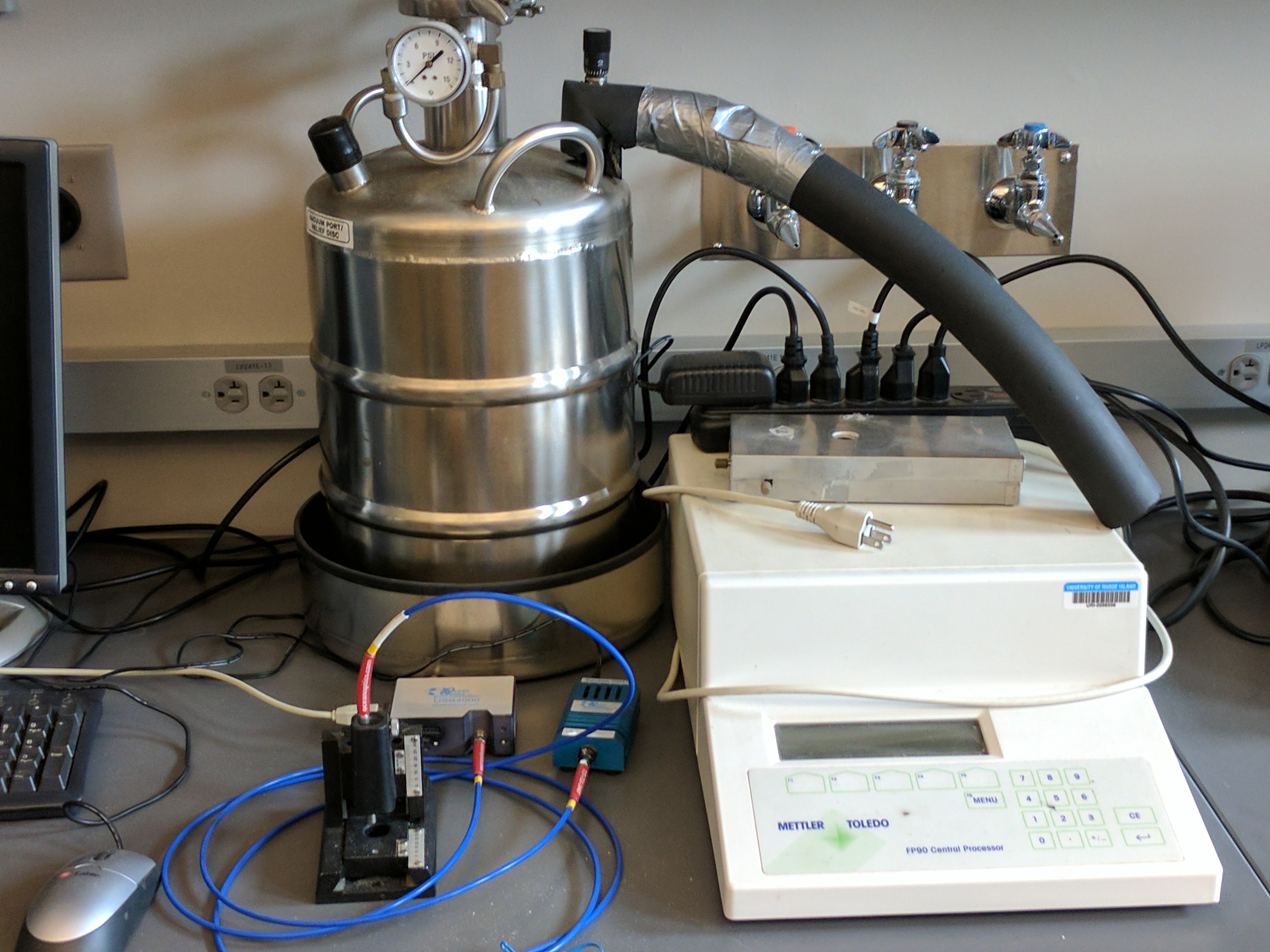Mettler-Toledo Cold Stage: The cold-stage provides a constant temperature to a stage for samples placed on microscope slides. This is coupled with an Ocean-Optics reflectance spectrometer to allow measurement of spectra as a function of temperatures below ambient. 