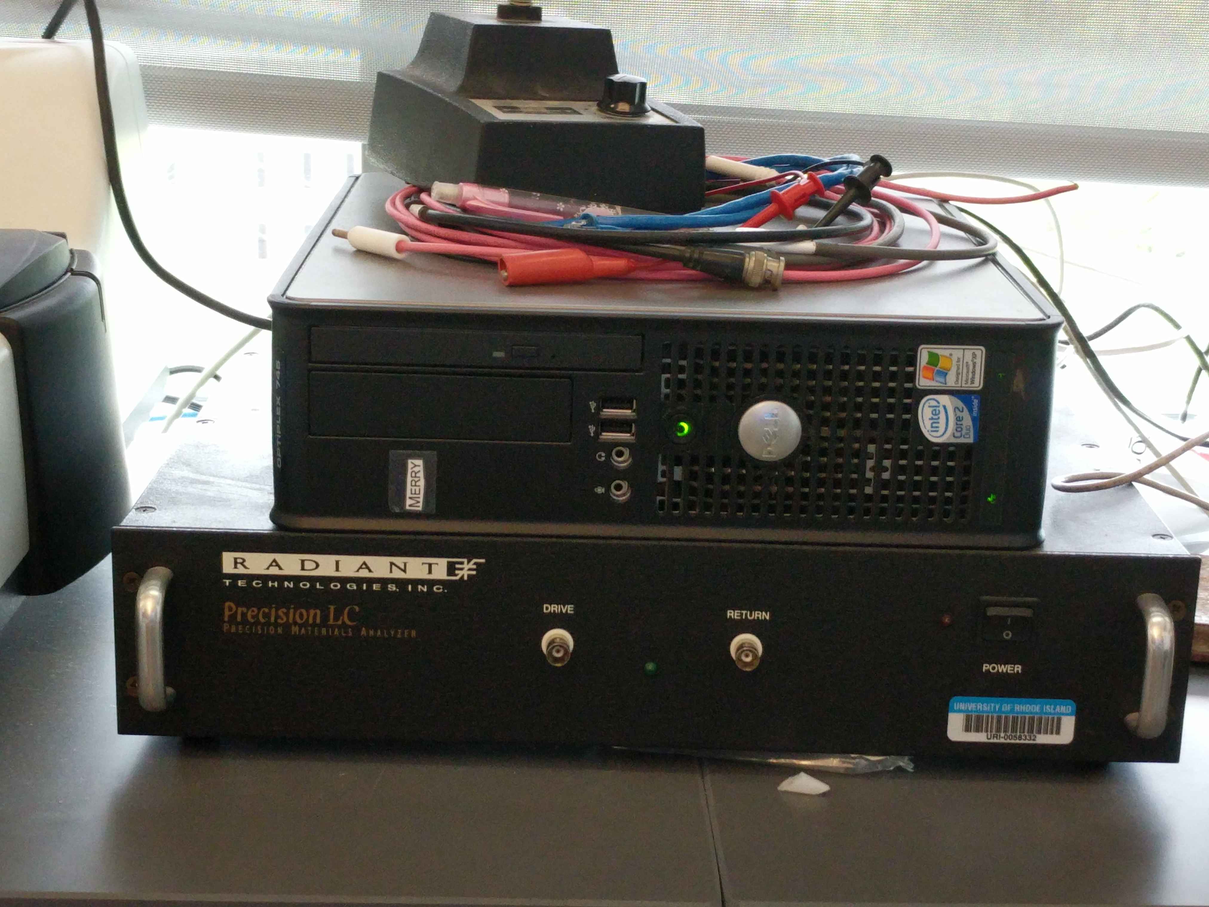 Radiant Ferroelectric Tester: This instrument measures current and voltage using a Sawyer-Tower circuit to determine the electrical polarization of a sample. This is used to establish whether a substance is ferroelectric or not.
